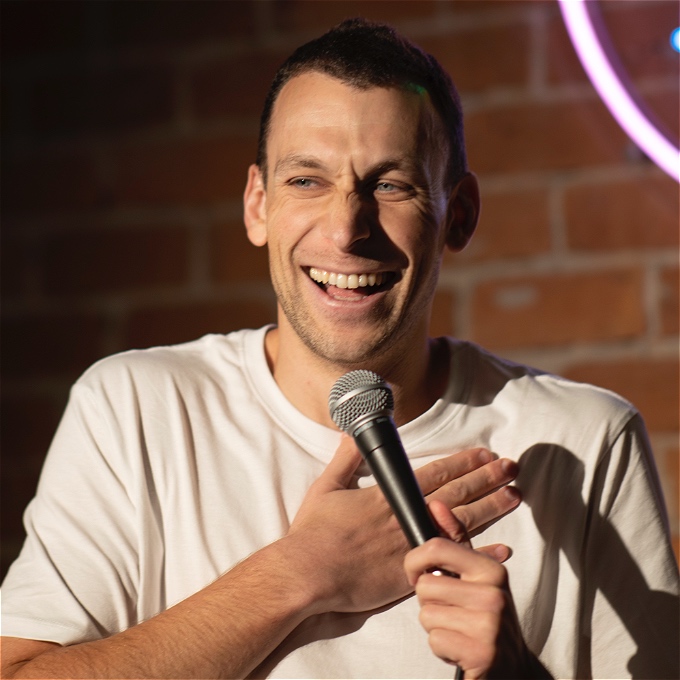 Michael Shafar laughing while performing.