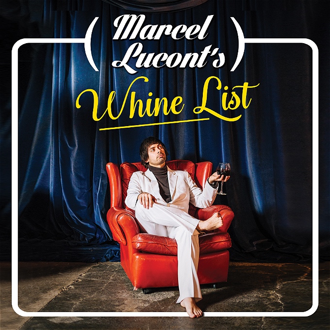 Marcel Lucont, an elegant, suave French man, reclines on a red armchair with a large glass of Château Margaux 1984