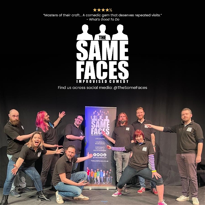 The cast of The Same Faces pose on stage with a banner for their show.